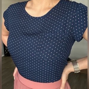 Blue with pink polka-dot blouse